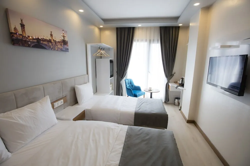 Deluxe Tek Büyük veya İki Ayrı Yataklı Oda, Şehir Manzaralı