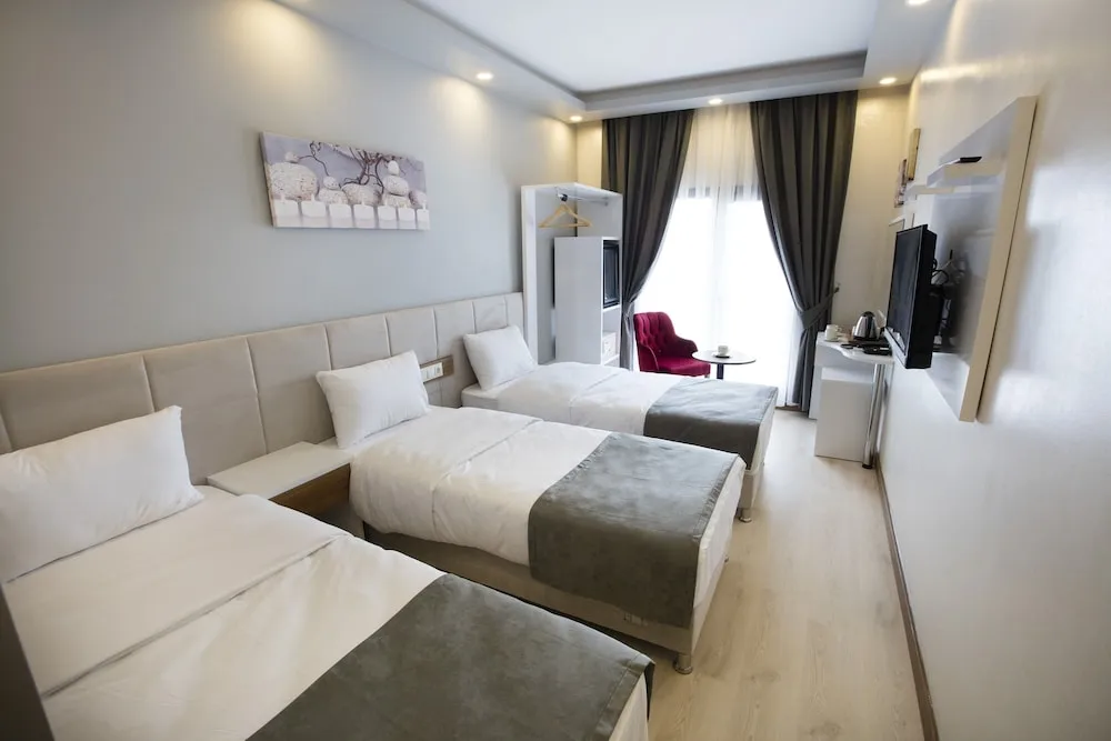 Deluxe Üç Kişilik Oda, Sigara İçilmez, Şehir Manzaralı