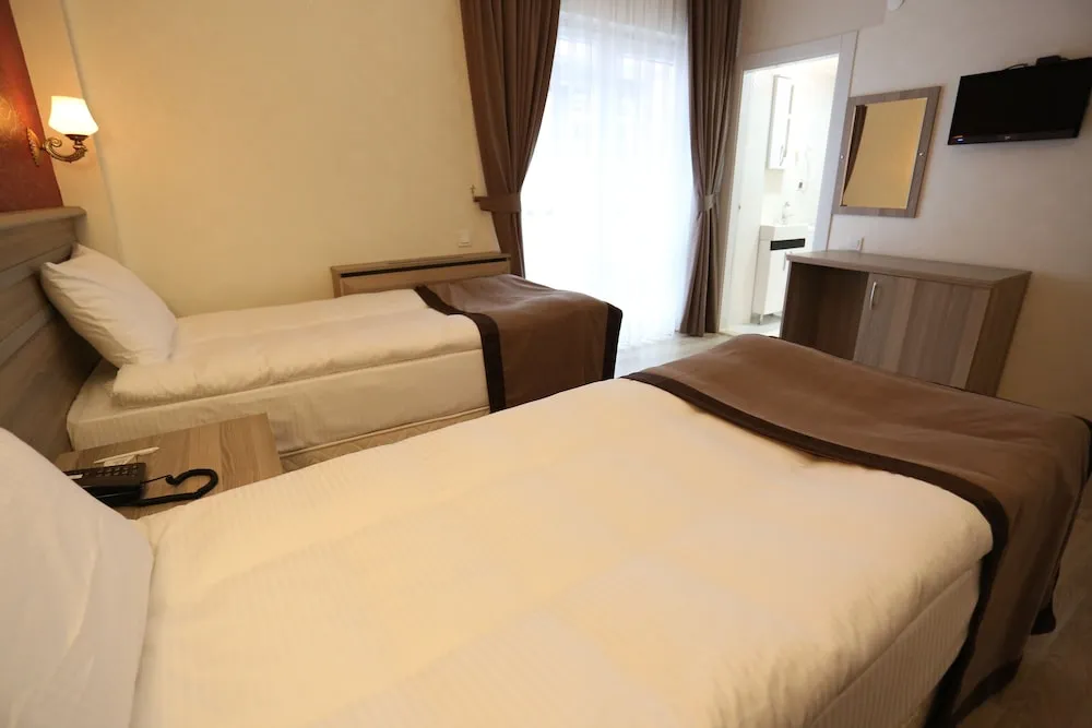 Economy Tek Büyük veya İki Ayrı Yataklı Oda