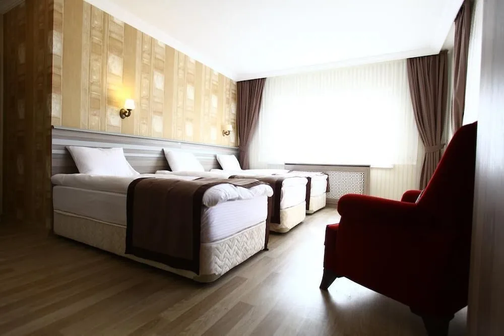 Deluxe Üç Kişilik Oda
