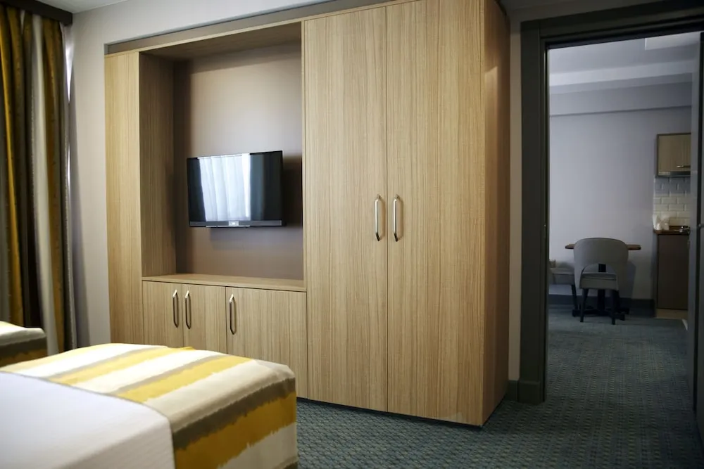 Deluxe Tek Büyük veya İki Ayrı Yataklı Oda