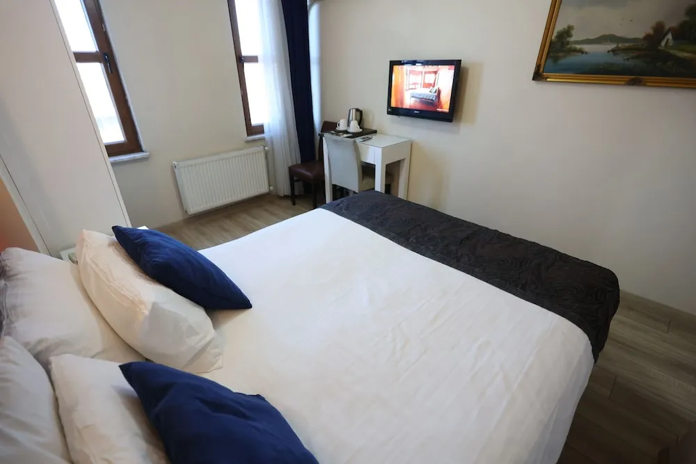 Deluxe Tek Büyük veya İki Ayrı Yataklı Oda
