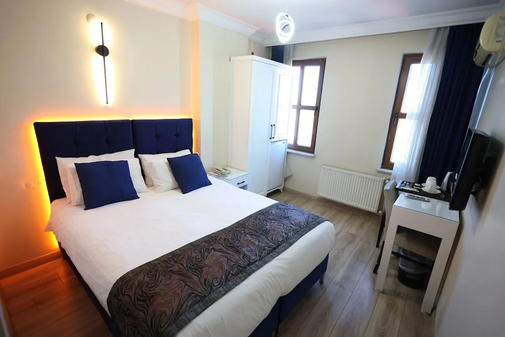 Deluxe Tek Büyük veya İki Ayrı Yataklı Oda