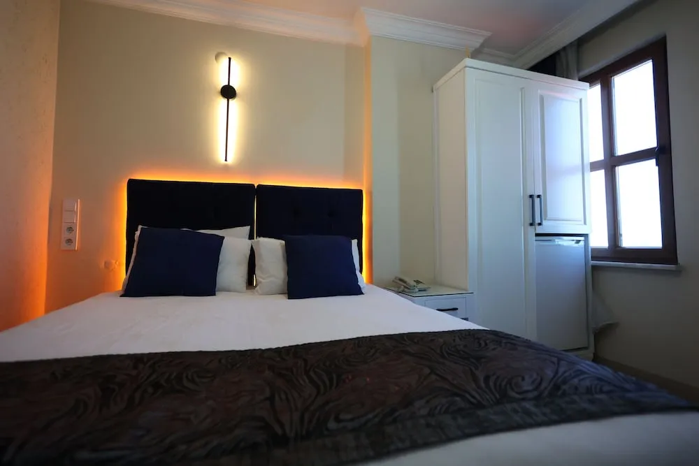 Deluxe Tek Büyük veya İki Ayrı Yataklı Oda