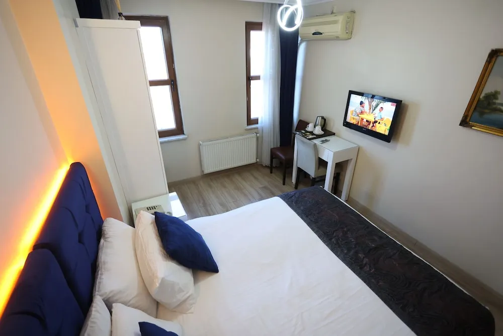 Deluxe Tek Büyük veya İki Ayrı Yataklı Oda