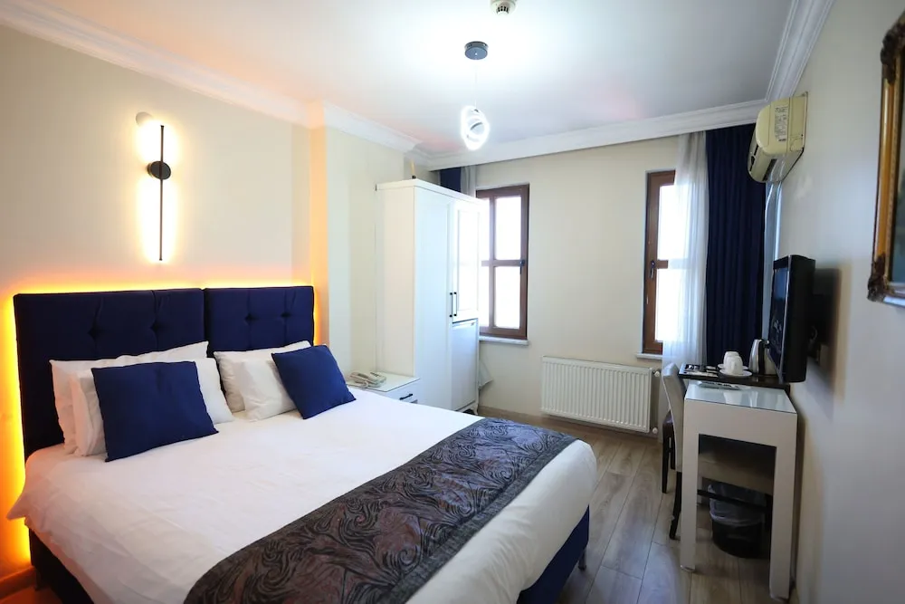 Deluxe Tek Büyük veya İki Ayrı Yataklı Oda