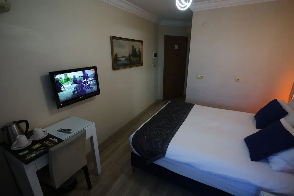 Deluxe Tek Büyük veya İki Ayrı Yataklı Oda