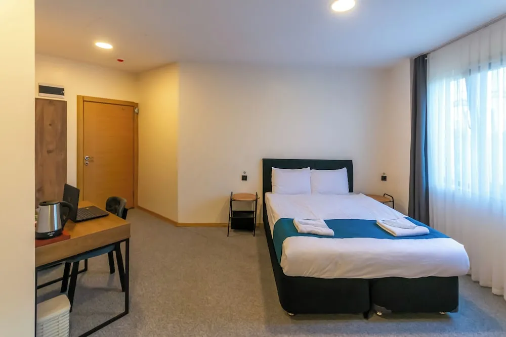 Deluxe Üç Kişilik Oda