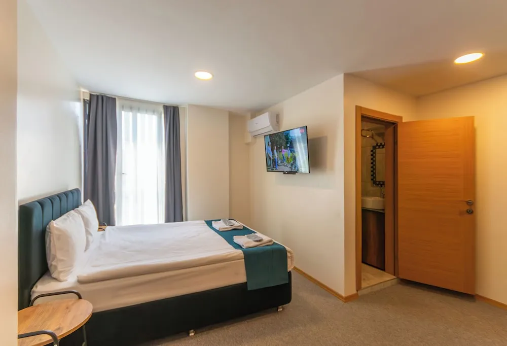 Deluxe Üç Kişilik Oda