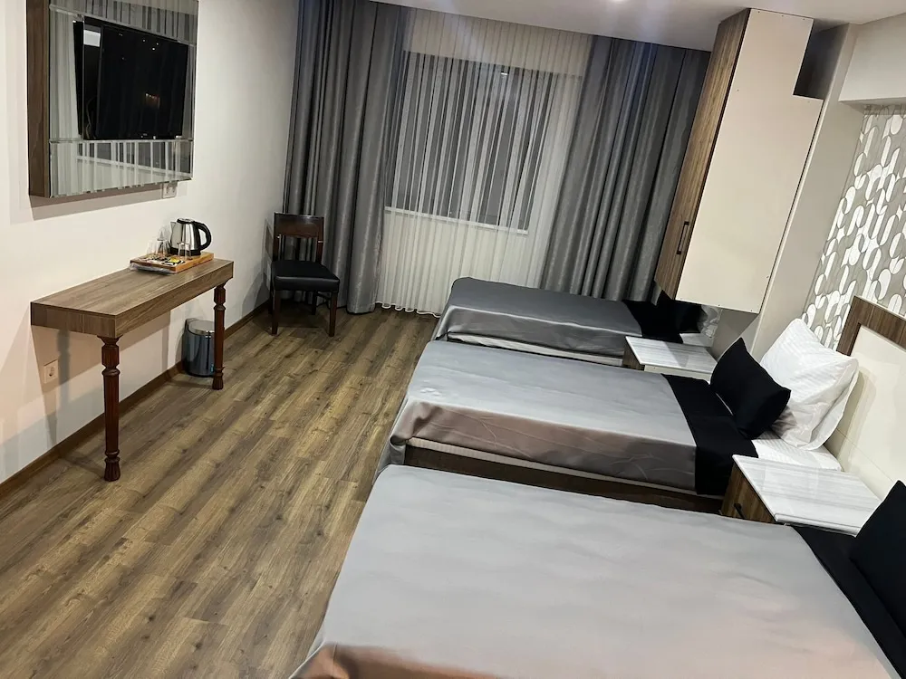 Deluxe Üç Kişilik Oda