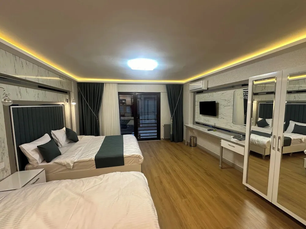 Deluxe Üç Kişilik Oda