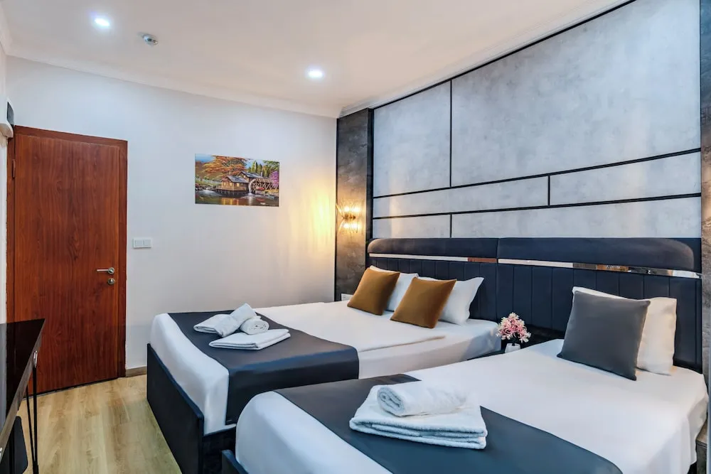 Deluxe Üç Kişilik Oda