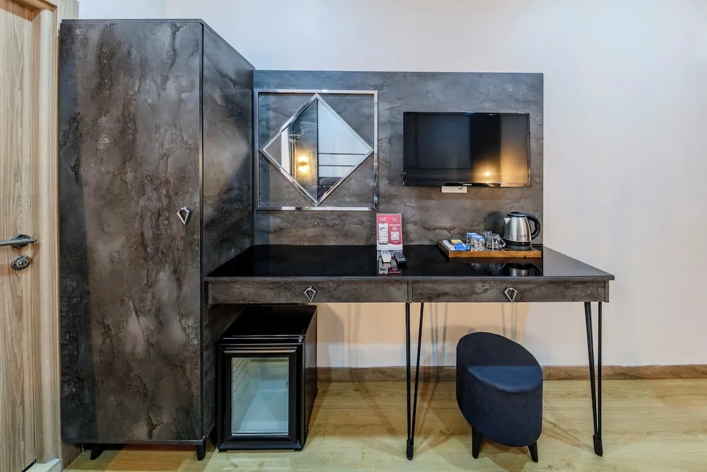 Deluxe Üç Kişilik Oda