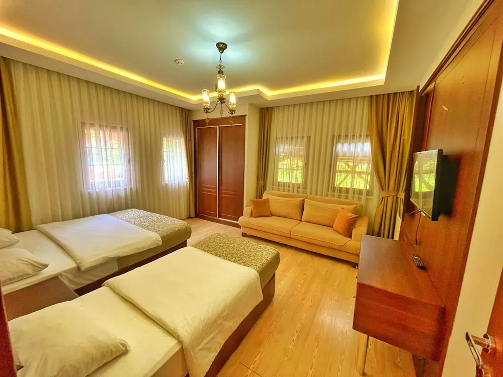 Deluxe Üç Kişilik Oda