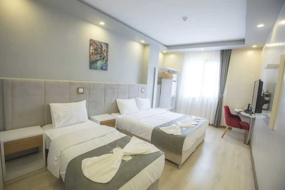 Deluxe Üç Kişilik Oda