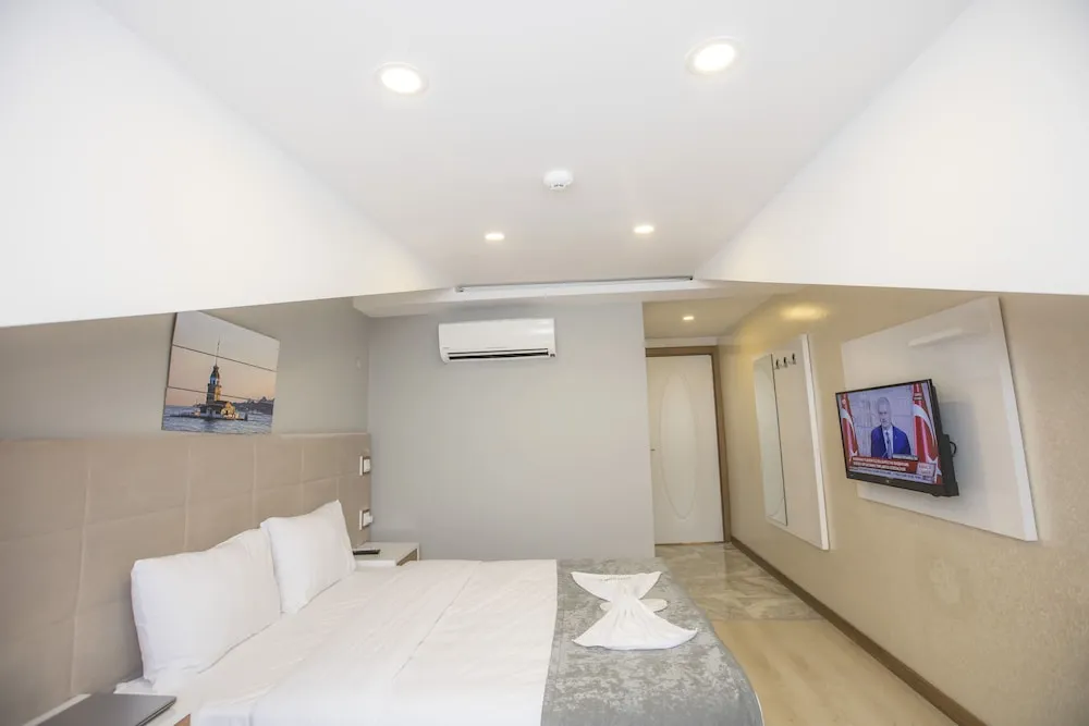 Deluxe Tek Büyük veya İki Ayrı Yataklı Oda