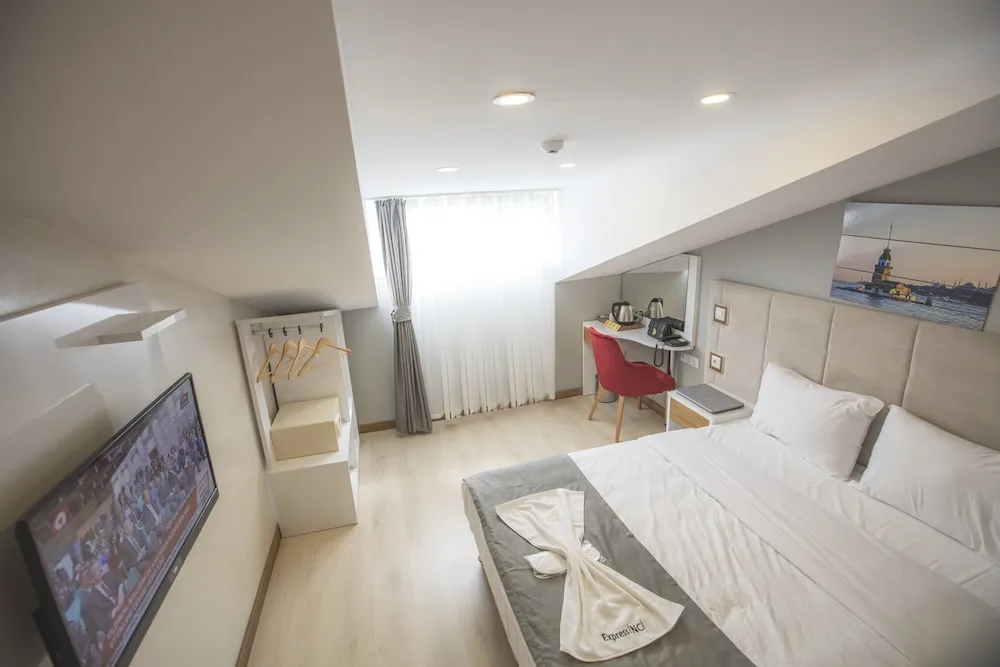 Deluxe Tek Büyük veya İki Ayrı Yataklı Oda