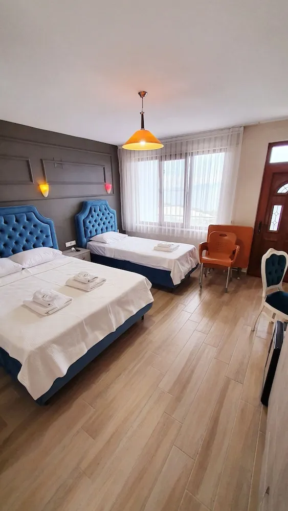 Deluxe Üç Kişilik Oda, Birden Çok Yatak, Sigara İçilmez, Deniz Manzaralı