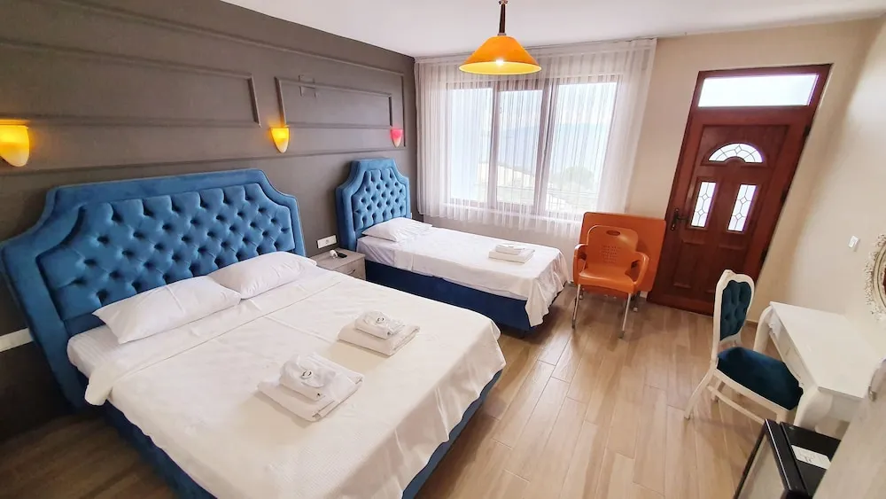 Deluxe Üç Kişilik Oda, Birden Çok Yatak, Sigara İçilmez, Deniz Manzaralı