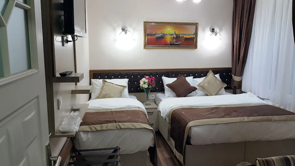 Deluxe Üç Kişilik Oda