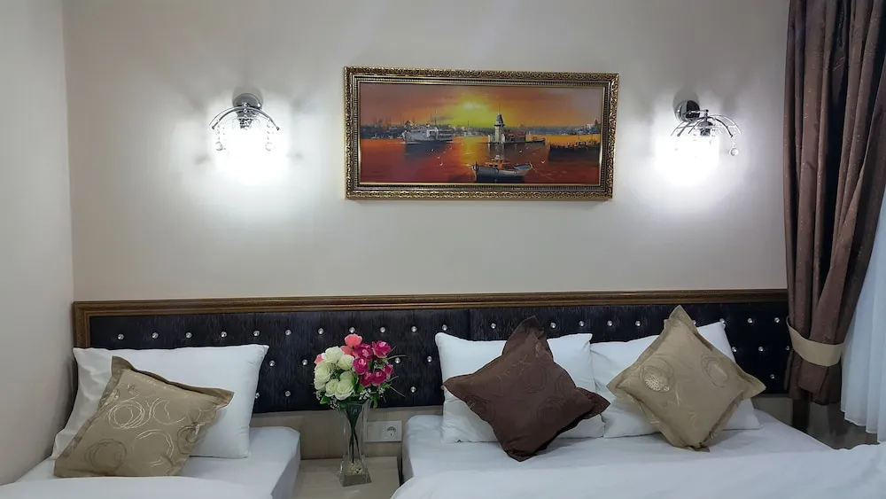Deluxe Tek Büyük veya İki Ayrı Yataklı Oda