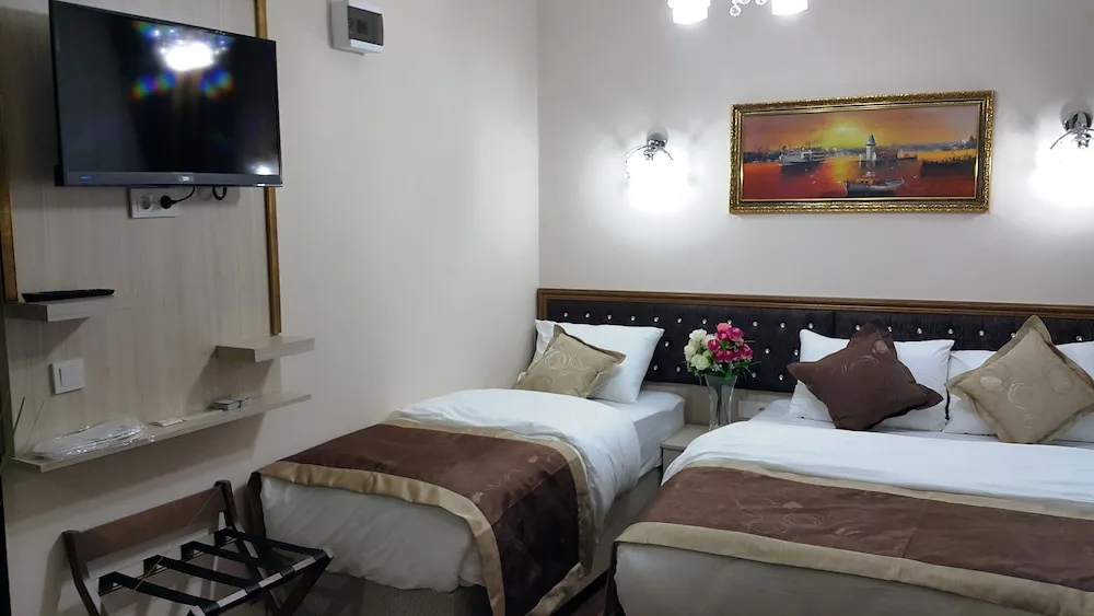 Deluxe Tek Büyük veya İki Ayrı Yataklı Oda