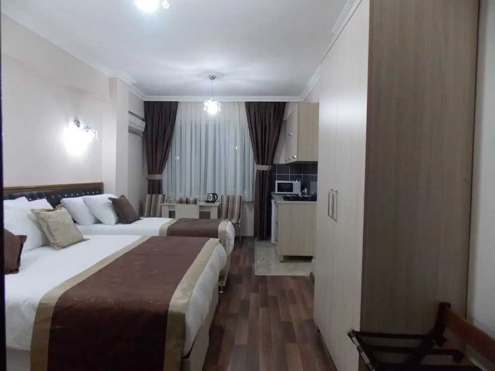 Deluxe Tek Büyük veya İki Ayrı Yataklı Oda