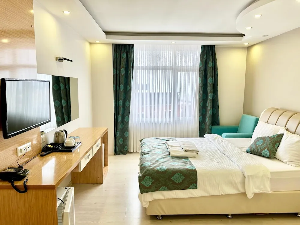 Deluxe Tek Büyük Yataklı Oda