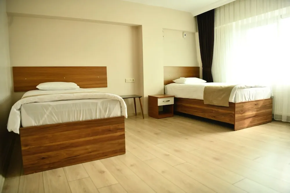 Basic Tek Büyük veya İki Ayrı Yataklı Oda
