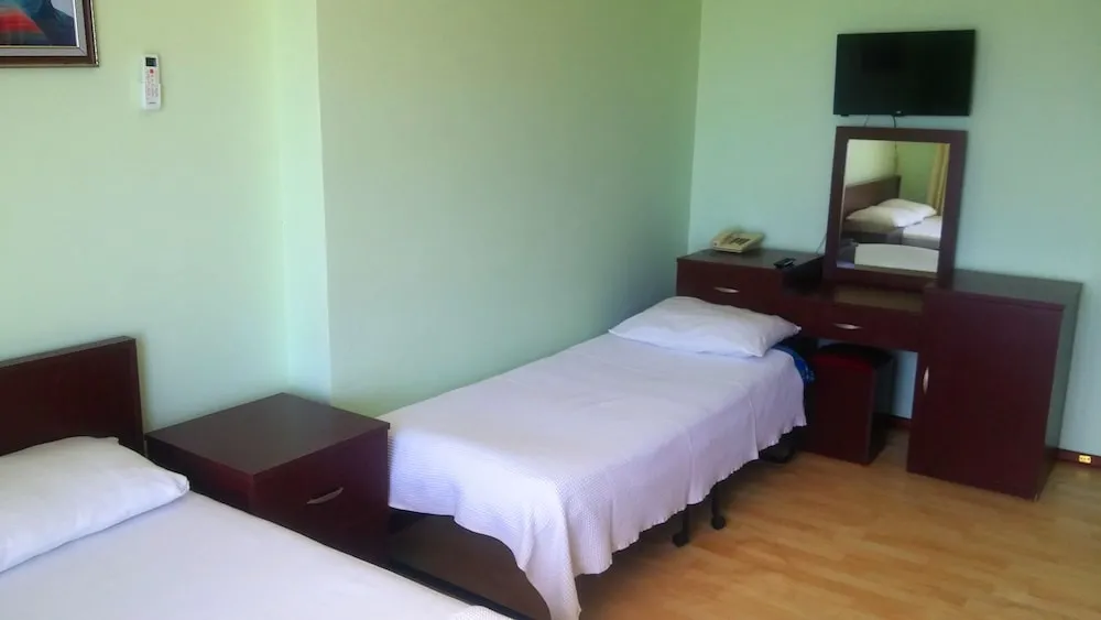 Comfort Üç Kişilik Oda, Bahçe Manzaralı