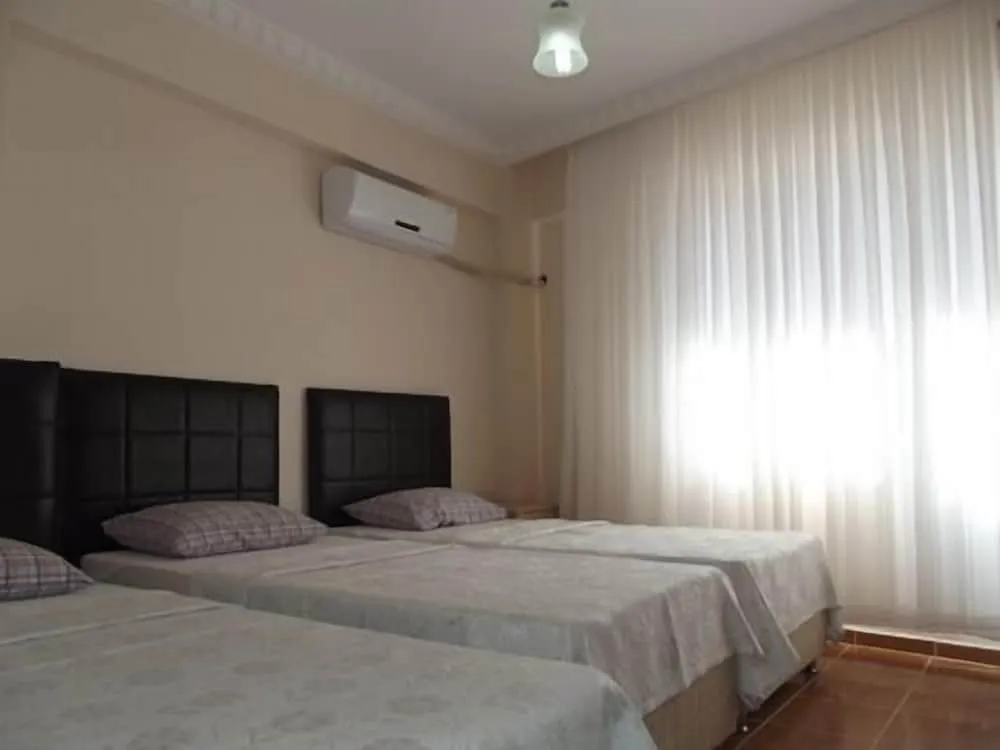Üç Kişilik Oda