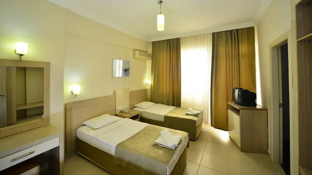 Economy Tek Büyük veya İki Ayrı Yataklı Oda (With Air Conditioning)