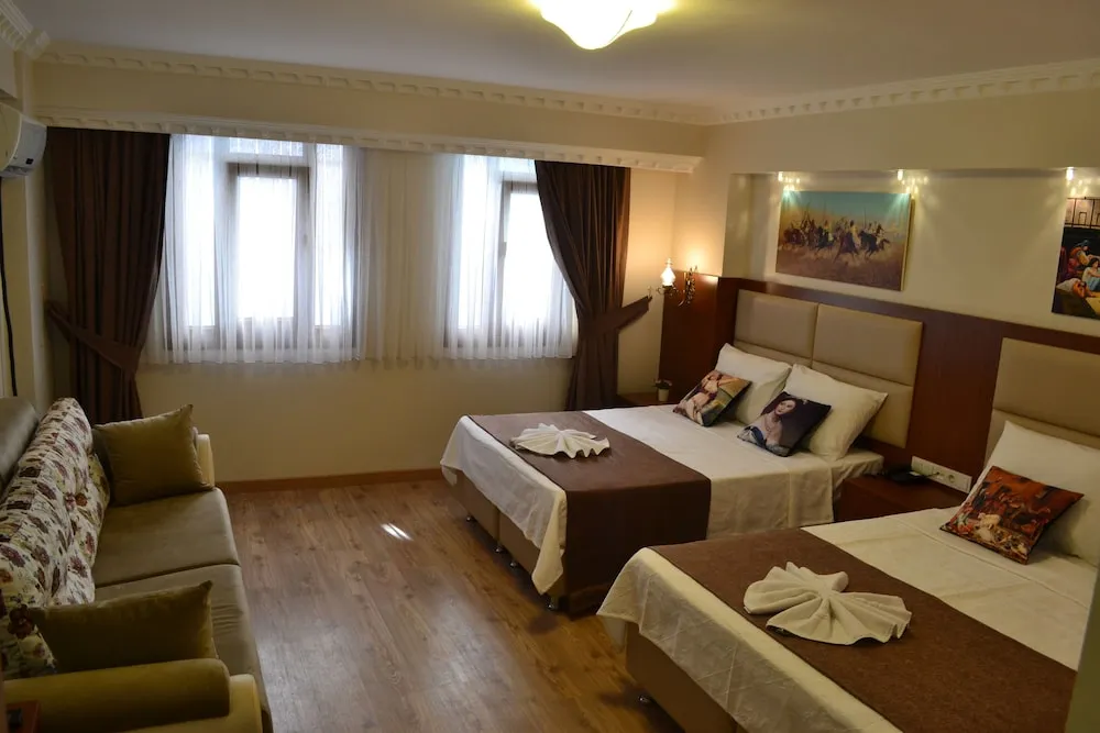 Deluxe Üç Kişilik Oda