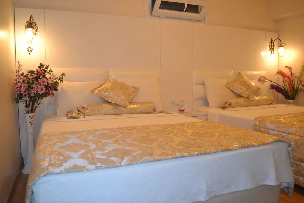 Deluxe Üç Kişilik Oda