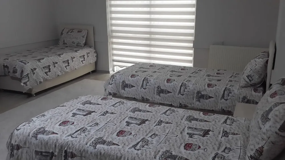 Economy Üç Kişilik Oda, Banyolu/Duşlu