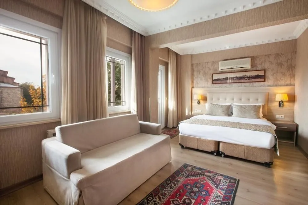 Deluxe Tek Büyük Yataklı Oda, 1 Büyük (Queen) Boy Yatak ve Çekyat, Balkon, Deniz Manzaralı