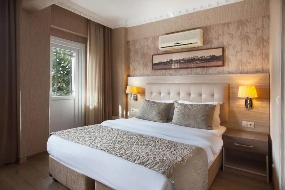 Deluxe Tek Büyük Yataklı Oda, 1 Büyük (Queen) Boy Yatak ve Çekyat, Balkon, Deniz Manzaralı