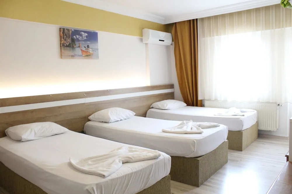 Üç Kişilik Oda