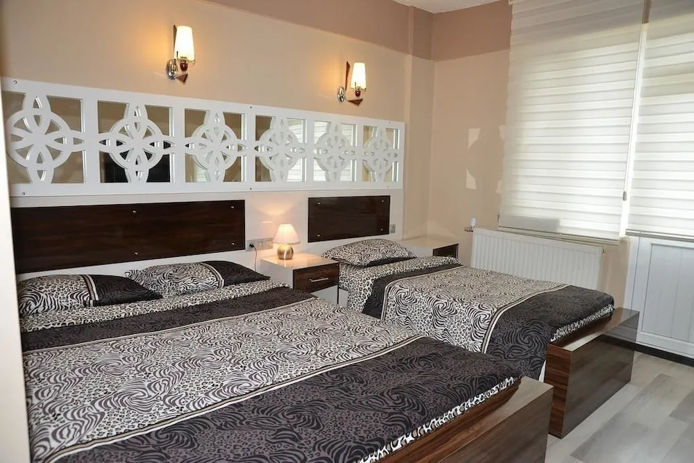 Deluxe Üç Kişilik Oda