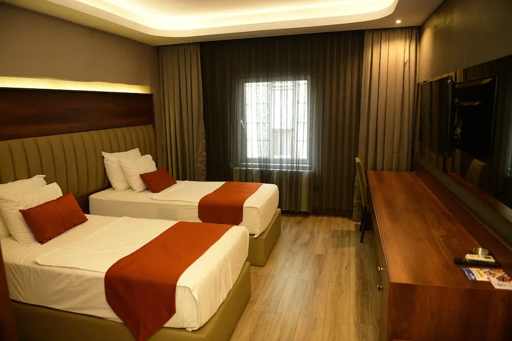 Superior (French + Single) Room
