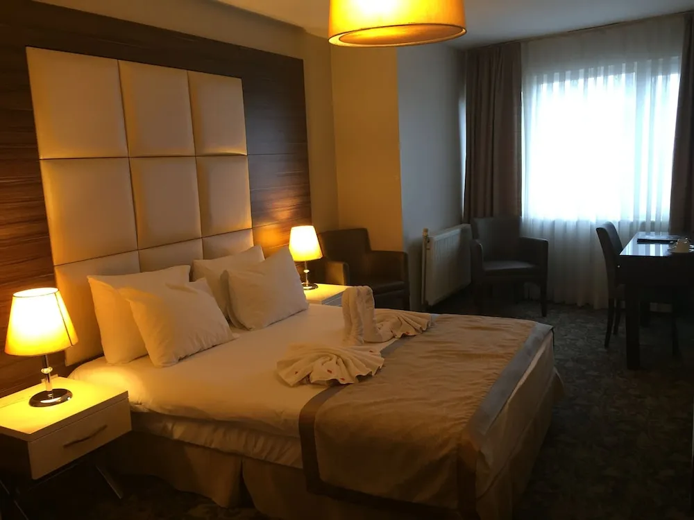 Deluxe Tek Büyük veya İki Ayrı Yataklı Oda