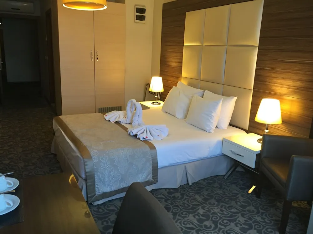 Deluxe Tek Büyük veya İki Ayrı Yataklı Oda