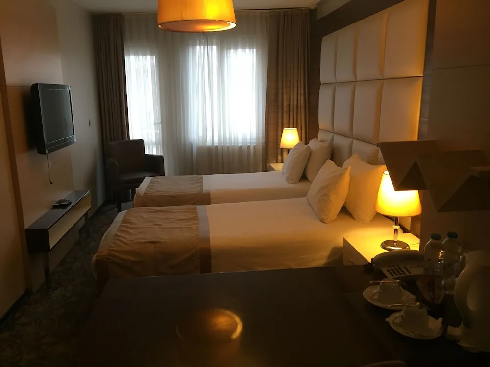Deluxe Tek Büyük veya İki Ayrı Yataklı Oda