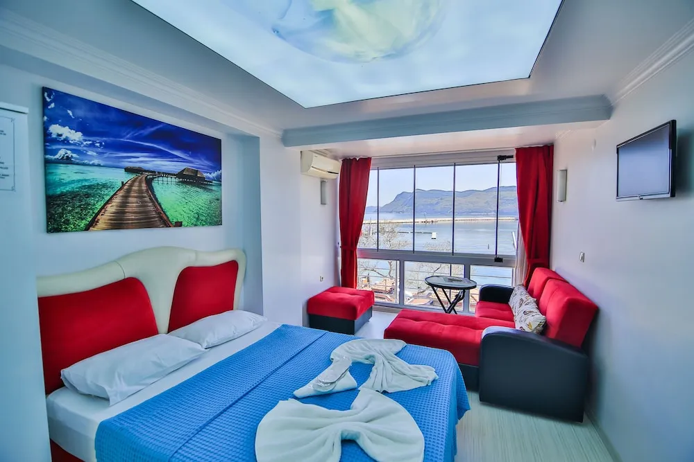 Standard Dört Kişilik Oda, 1 Yatak Odası, Sigara İçilebilir, Plaj Manzaralı