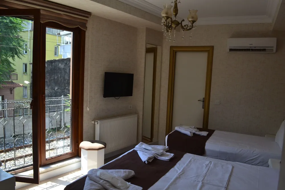 Üç Kişilik Oda, Şehir Manzaralı