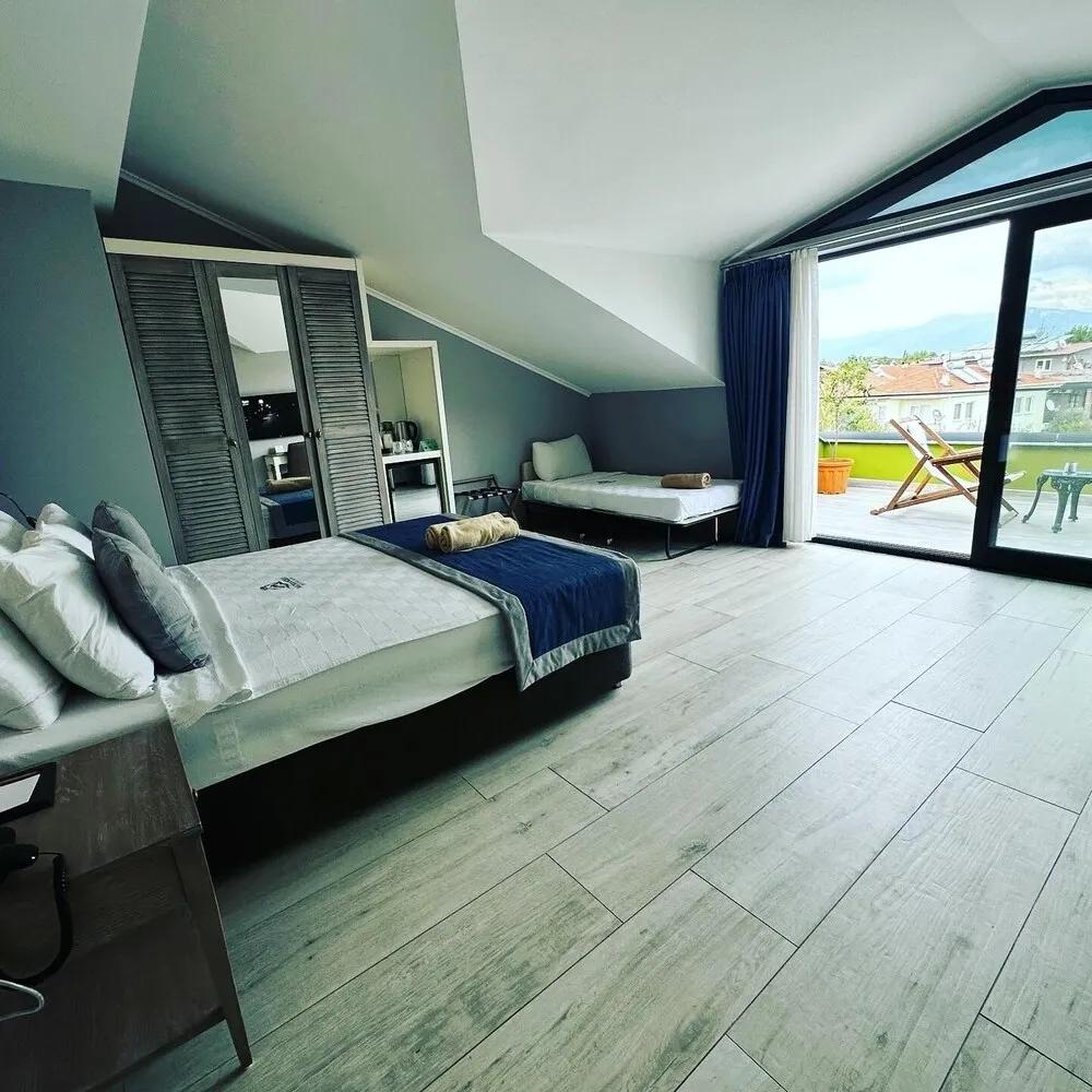 Deluxe Üç Kişilik Oda