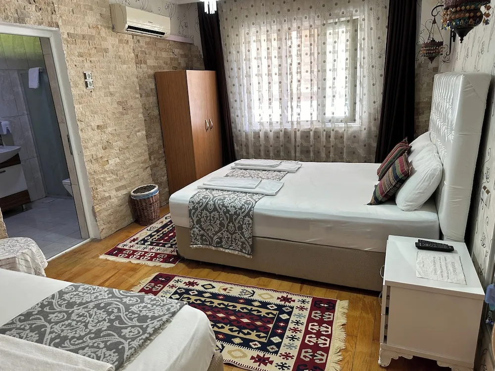 Üç Kişilik Oda