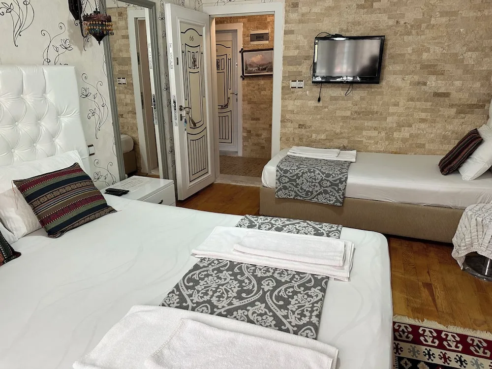 Üç Kişilik Oda