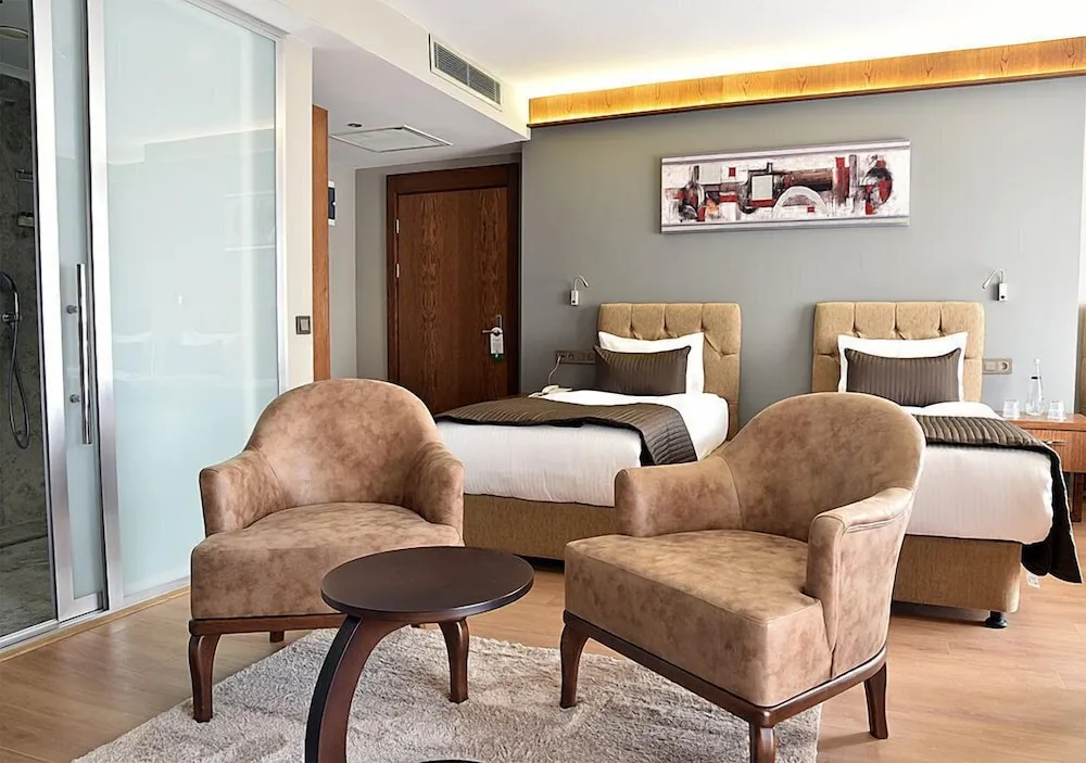 Deluxe Tek Büyük veya İki Ayrı Yataklı Oda, Balkon