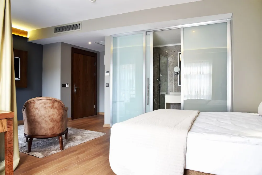 Deluxe Tek Büyük veya İki Ayrı Yataklı Oda, Balkon